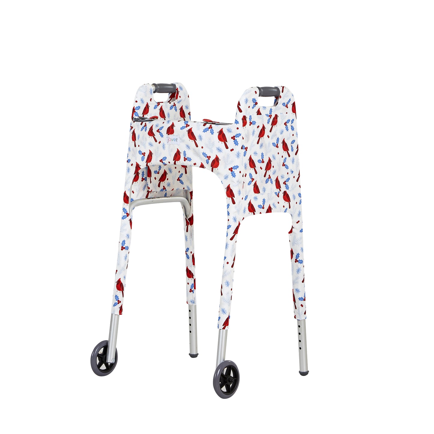 Front left view of the Jover Walker Cover in Winter Birds, a snowy white backdrop with cardinals and holly berries, perfect for celebrating the season. Equipped with four pockets, it's the only walker accessory you need to stroll in style.