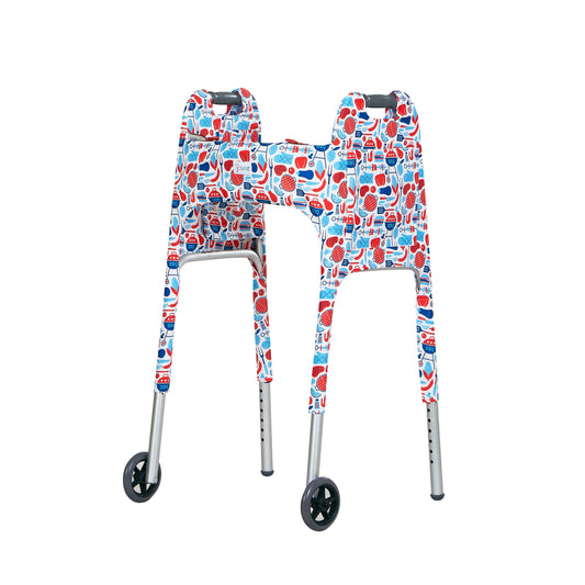Red, white, and blue cookout-themed print walker cover with pockets on a standard folding walker with wheels on a white background - left 3/4 view.