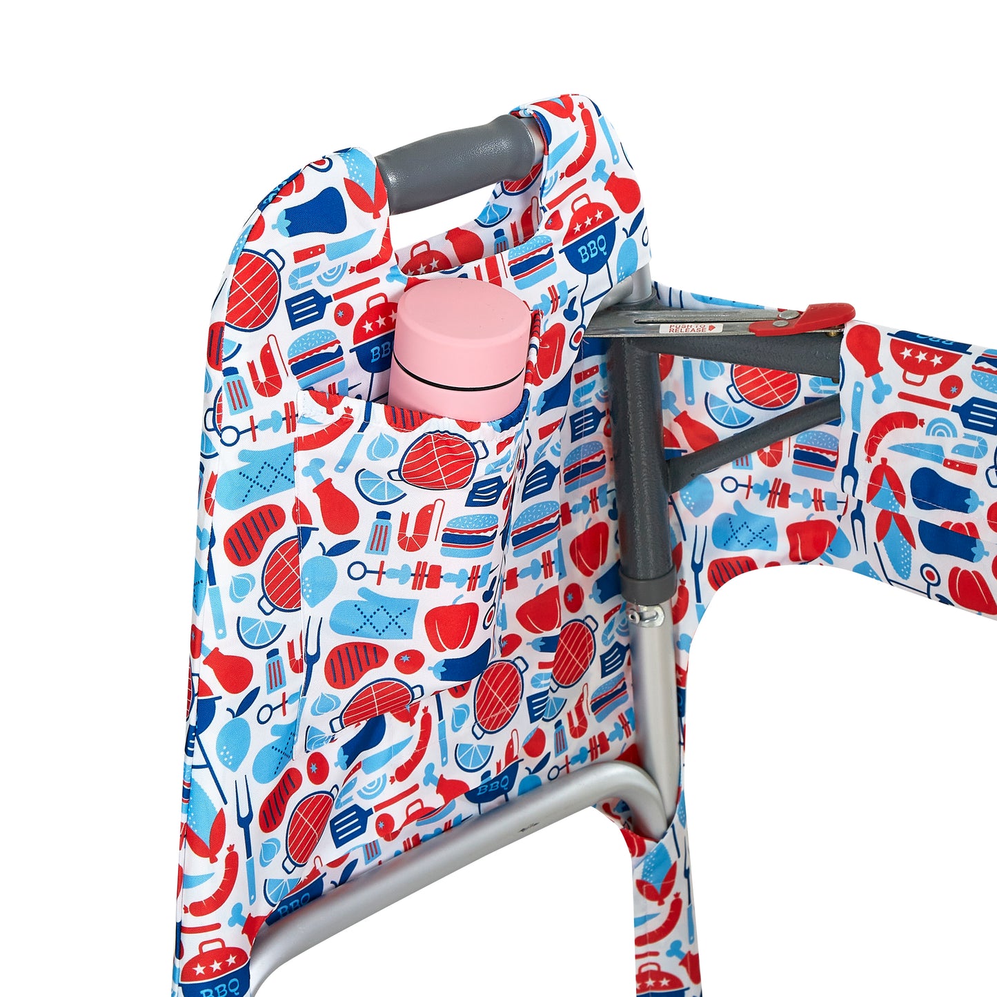 Red, white, and blue cookout-themed print walker cover with pockets on a standard folding walker with wheels on a white background - inside pocket detail showing water bottle in the pocket.
