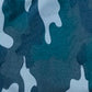 Fabric swatch detail of the Jover Walker Cover in Woodland Camo, a blend of shades of green and gray that evokes nature. This cover, equipped with four convenient pocket, is the only walker accessory you need when enjoying the great outdoors.