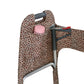 Leopard-print walker cover with pockets on a standard folding walker with wheels on a white background - inside pocket detail with pocket holding a water bottle.