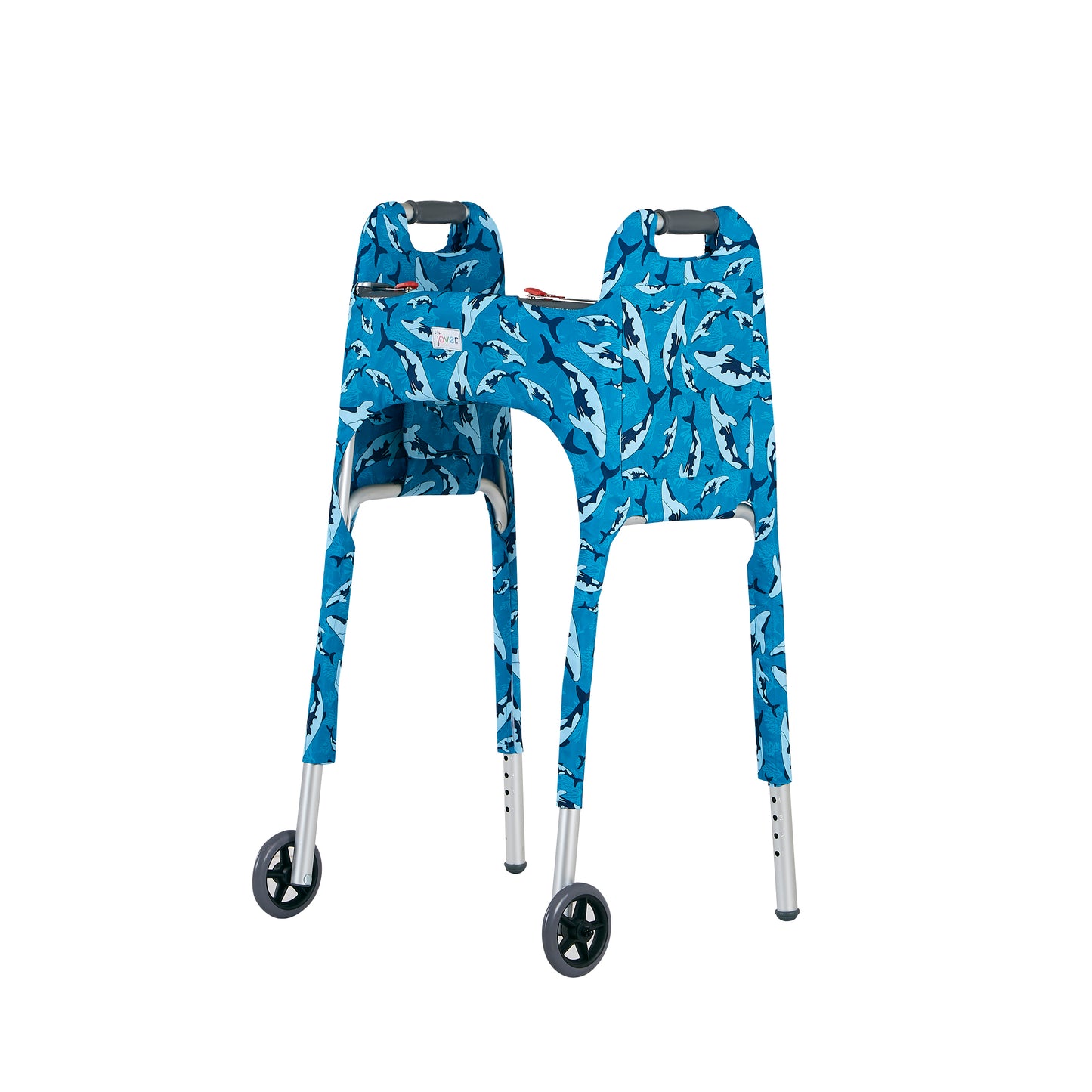 Product photo of the Jover Walker Cover in a swimming whale pattern in shades of blue. View highlights a large side pocket and adjustable straps with hook-and-loop "Velcro" closures, allowing the cover to be securely and simply attached to the front wheeled walker.