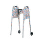 Multi-colored pastel wildflower-print walker cover with pockets on a standard folding walker with wheels on a white background - inside 3/4 view.
