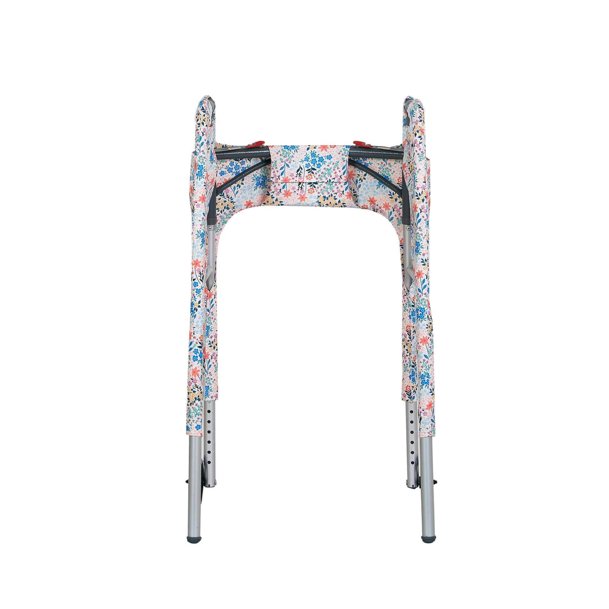 Multi-colored pastel wildflower-print walker cover with pockets on a standard folding walker with wheels on a white background - inside view.